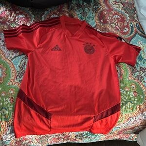 Size small soccer jersey color red